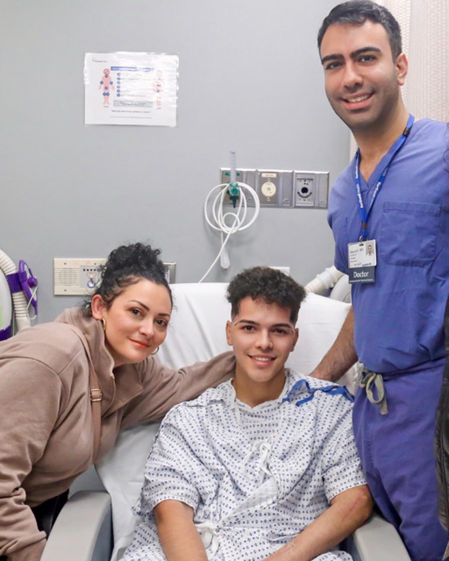 Dr. Rasouli at the bedside with his patient and family